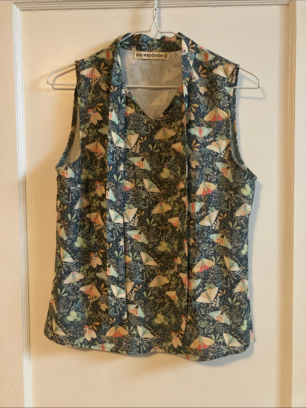 Womens Sleeveless Top in Moth Print with tie neck